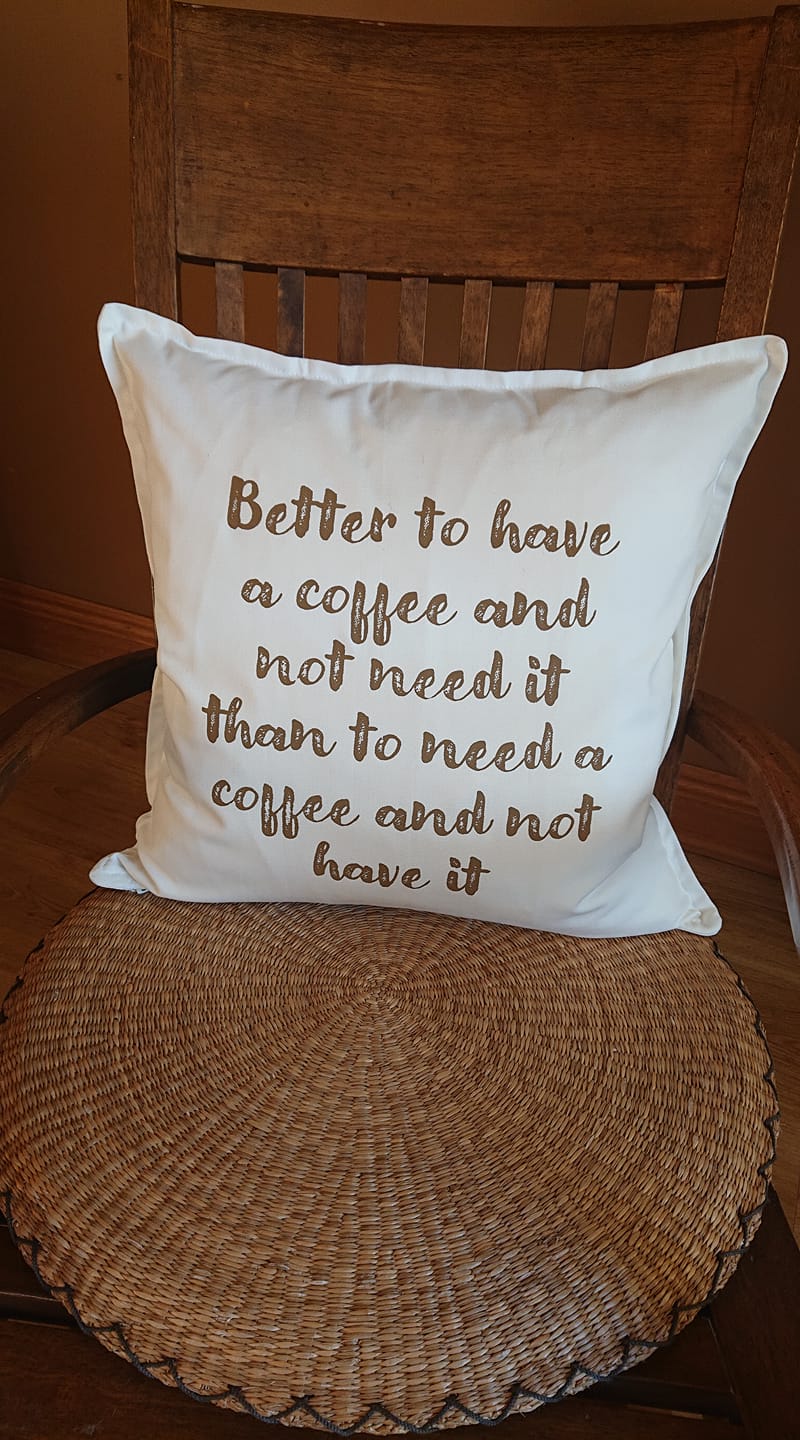 Cushion with coffee slogan