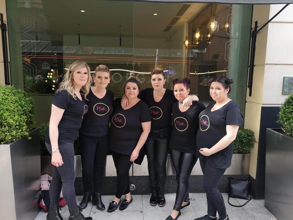 hen party showing off the front of personalised t-shirts